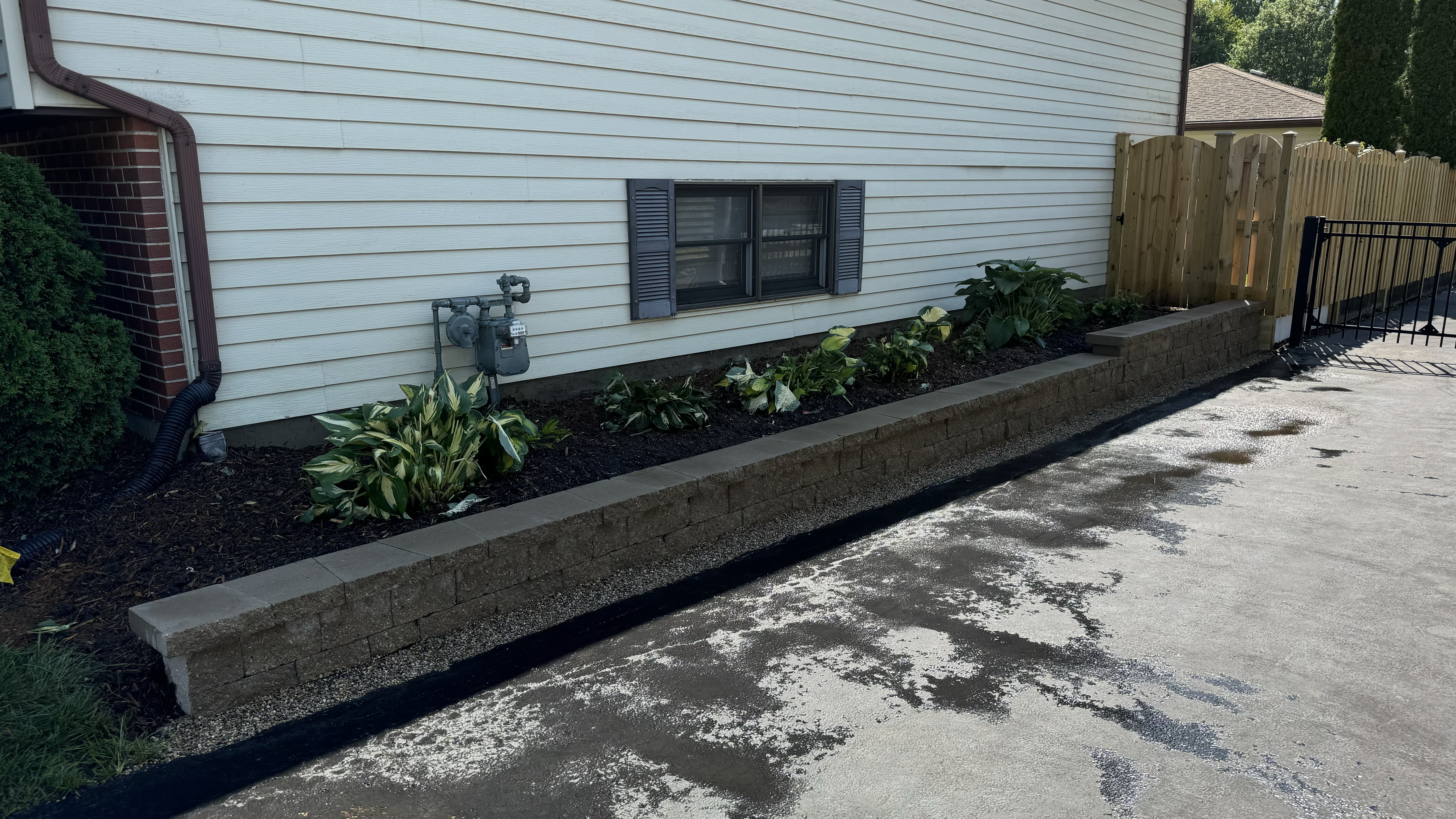 Rescuing A Failing Retaining Wall in Lombard, IL: A Journey with Mission Brick Paving and Unilock Estate Wall™ Thumbnail