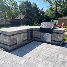 This-Wheaton-Backyard-Has-It-All-Pavers-Fire-Pit-Kitchen-Summer-Vibes 1