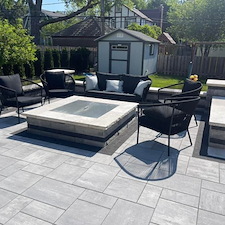 This-Wheaton-Backyard-Has-It-All-Pavers-Fire-Pit-Kitchen-Summer-Vibes 0